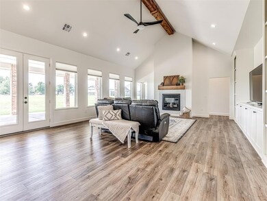 This large living room w/ custom shades, cathedral