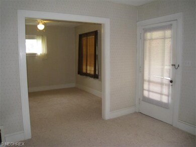 Front door entrance and view into the dining room 