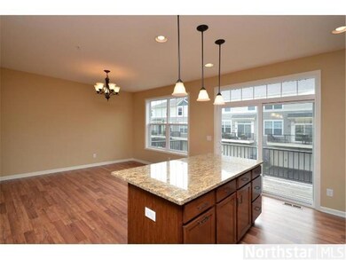 Kitchen features granite countertops, a large isla