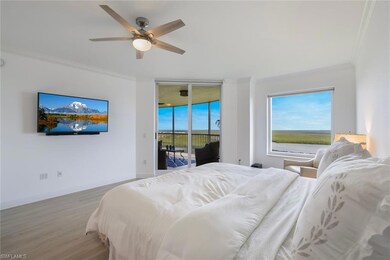 Bedroom featuring light wood-style flooring, baseb