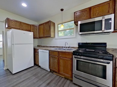 Kitchen has window above sink for natural light