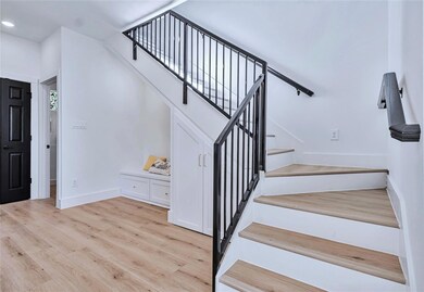 Staircase featuring recessed lighting, baseboards