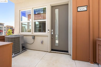 Doorway to property featuring stucco siding