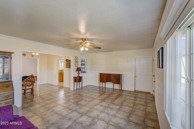 Living room opens to dining area