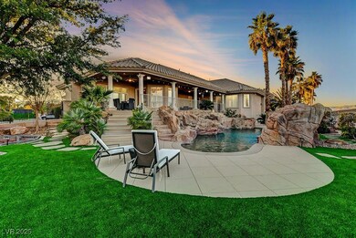 Rear view of property with a patio, stucco siding,