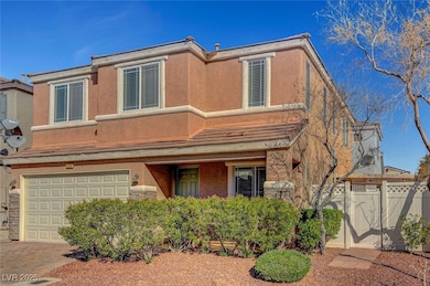 View of front of home with decorative driveway, fe