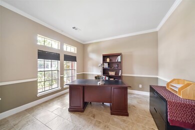 Spacious tiled study with views of the front yard.