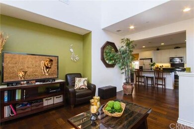 View of the family room towards the kitchen.  Noti