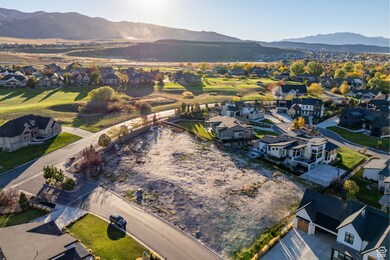 Aerial perspective of suburban area with a mountain backdrop