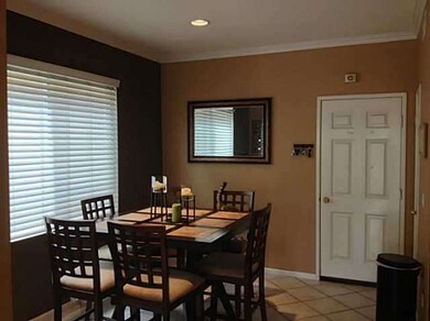 Dining area with custom paint, tile floors and cro