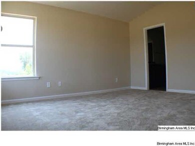 MASTER BEDROOM LOCATED IN REAR OF HOME FOR EXTRA P
