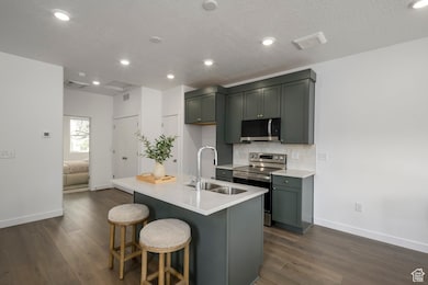 Whether it’s a quick breakfast or dinner with friends, this kitchen makes it easy. *model home
