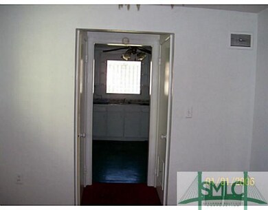 View. HALL WAY FROM DINING ROOM INTO KITCHEN