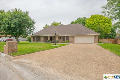 Right Front - Note Raised Pebble Driveway