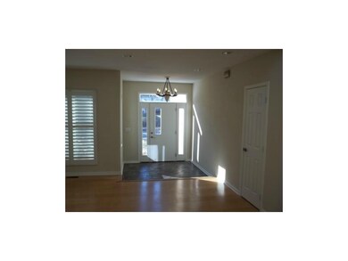 Welcoming Entry Way with Brazilian Slate Tile and 