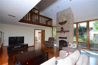 Fireplace and bamboo flooring in this great room
