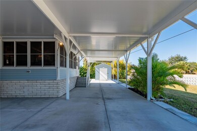 Front View of Sunroom and Carport