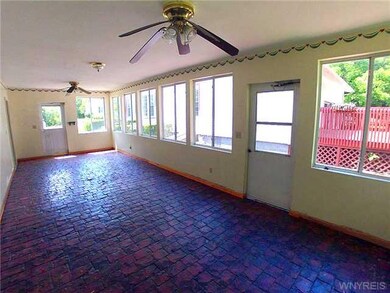 Other. Sun Room on side of garage.  Leads to a sto