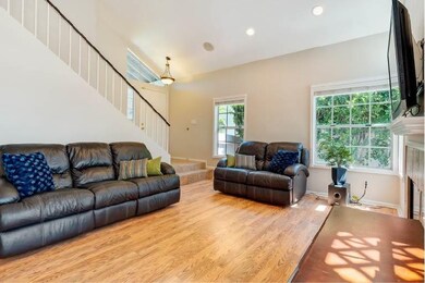 Neutral colors, wood laminate floors, and plenty o