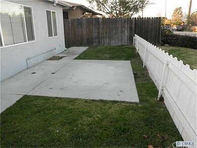 Front enclosed yard with concrete patio