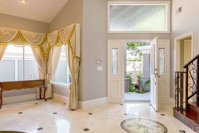 Notice the gorgeous Italian Marble floors with ins