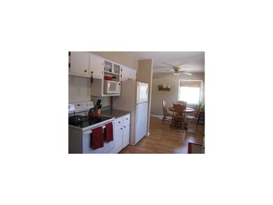 Kitchen. The eat-in-kitchen is bright and cheery w