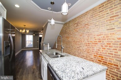 2109 E Chase St, Baltimore, MD 21213 - photo 6