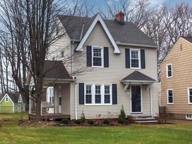 Notice the charming side porch with swing