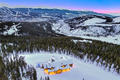 Snowy aerial view featuring a mountain view