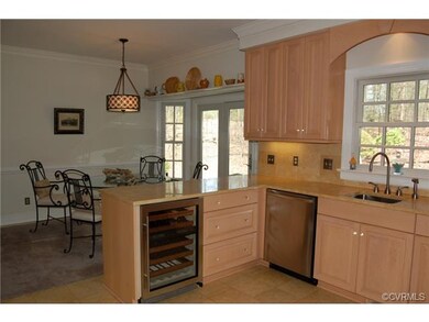 Kitchen opens to Breakfast Area
