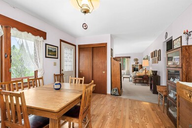 Dining room with light wood-style floors