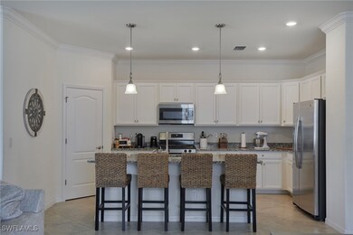 Kitchen featuring appliances with stainless steel