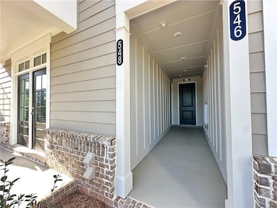 Doorway to property with french doors and covered porch