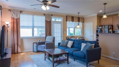Open concept kitchen, dining, living.
