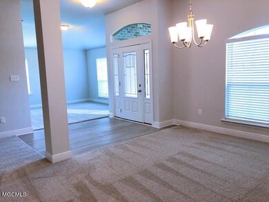 foyer, formal dining and study