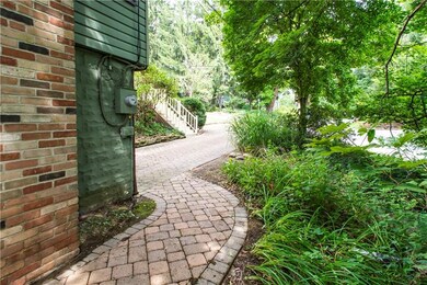 paved walkway leading from driveway #1 to rear of 