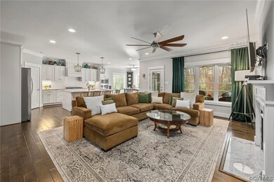 Great Room featuring ceiling fan, wood-type floori
