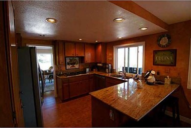 Beautiful custom slab granite countertops. LG refr