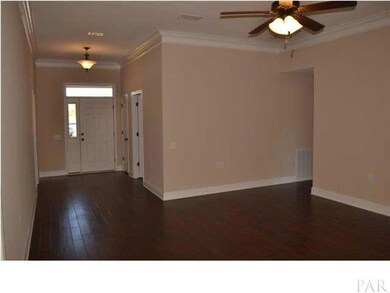 Foyer to Living Room. See the great wood floor.