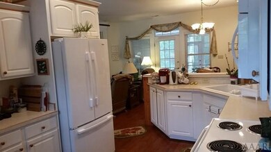 Kitchen opens to dining and great room