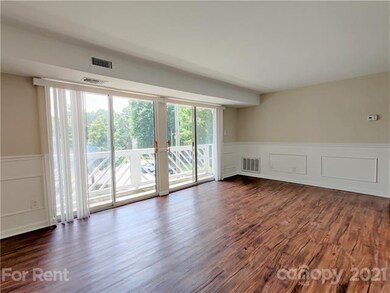Living room has double sliding glass and picture p