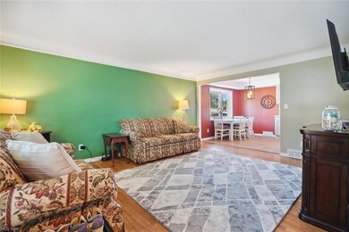 View of hardwood floored living room