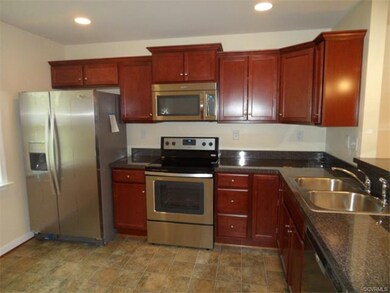 KITCHEN HAS SMOOTH TOP RANGE, DISHWASHER, MICROWAV