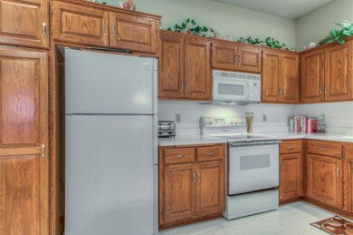 Tons of counter space and cabinets, recessed light