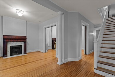 Unfurnished living room with a premium fireplace,