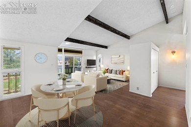 Virtually staged dining and living area