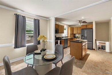 Dining Room featuring crown molding, chair rail an