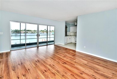 LIVING ROOM WITH WATER VIEW