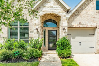 this front door combines glass and wood. They blen