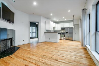 Open floorplan with stunning hardwood floors